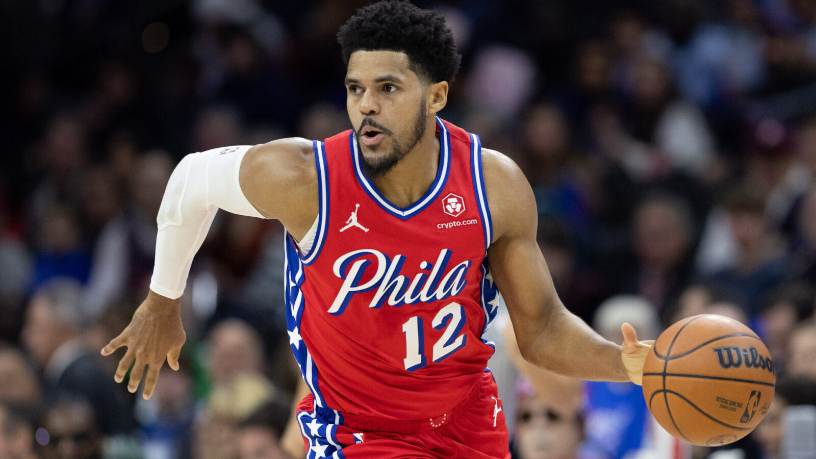 Dec 15, 2023; Philadelphia, Pennsylvania, USA; Philadelphia 76ers forward Tobias Harris (12) dribbles up court against the Detroit Pistons during the first quarter at Wells Fargo Center.