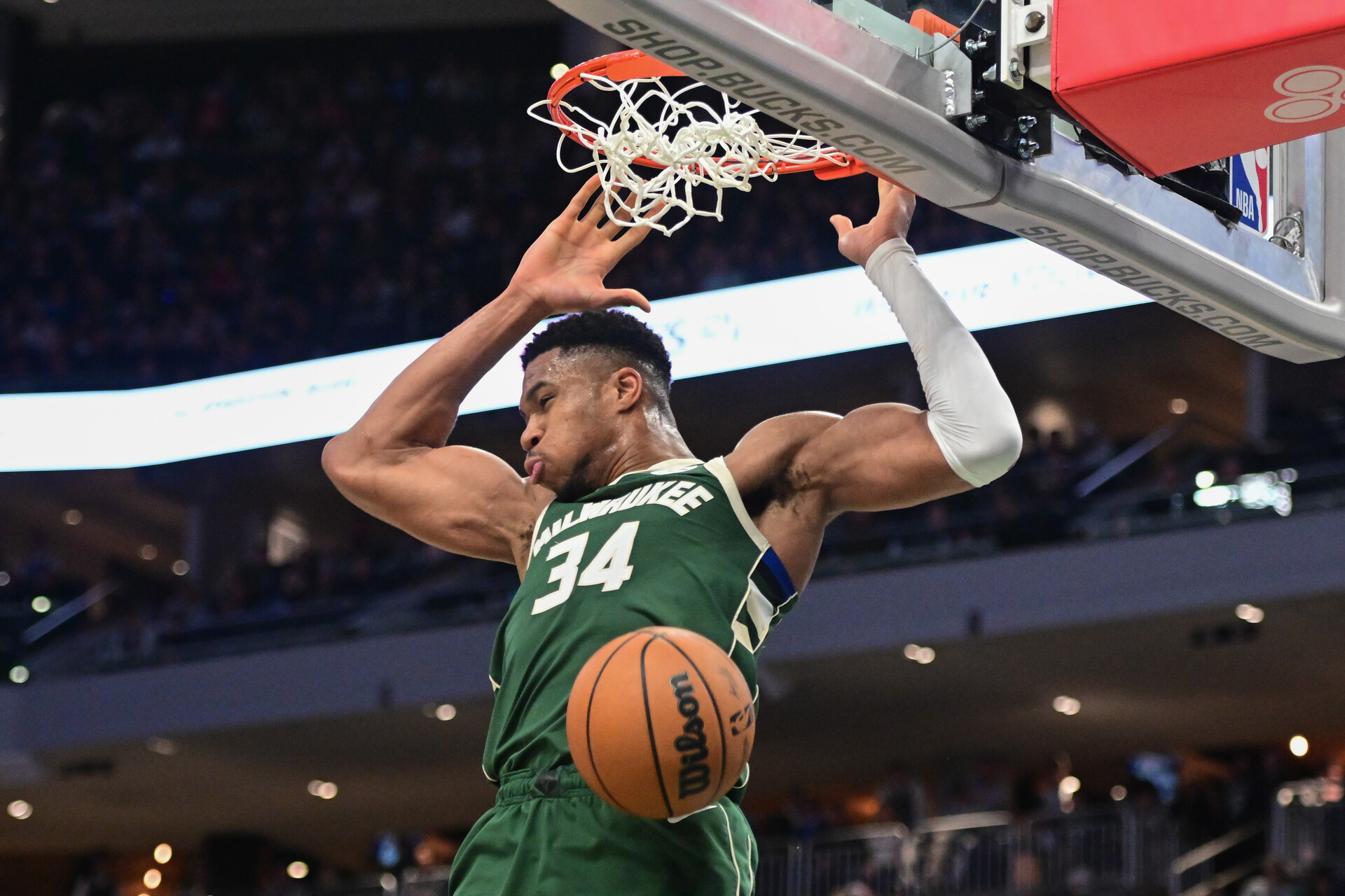 Dec 16, 2023; Milwaukee, Wisconsin, USA; Milwaukee Bucks forward Giannis Antetokounmpo (34) dunks a basket in the third quarter against the Detroit Pistons at Fiserv Forum.