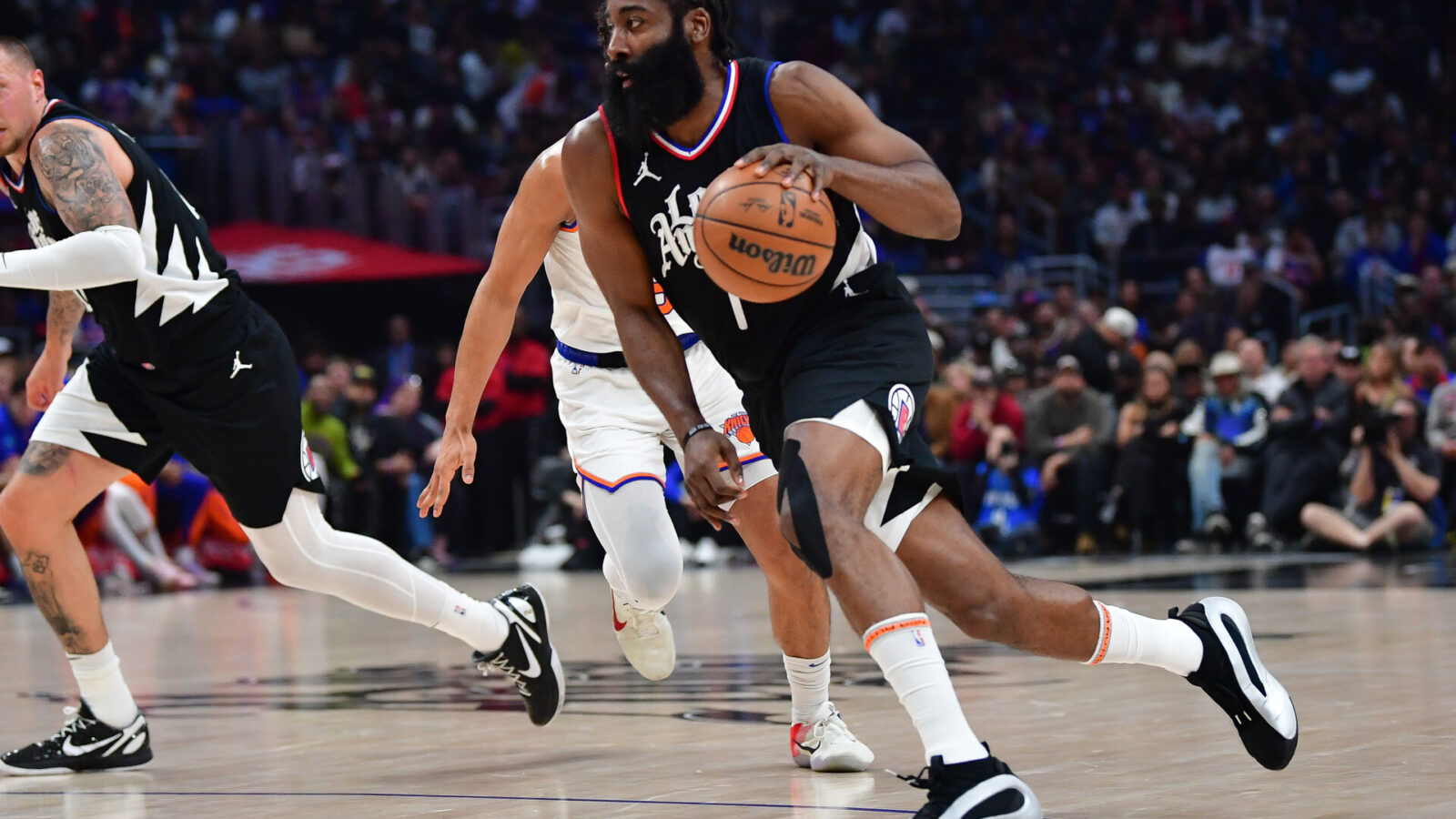 Dec 16, 2023; Los Angeles, California, USA; Los Angeles Clippers guard James Harden (1) moves to the basket against the New York Knicks during the first half at Crypto.com Aren