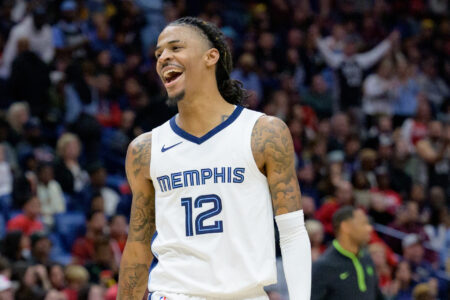 Dec 19, 2023; New Orleans, Louisiana, USA; Memphis Grizzlies guard Ja Morant (12) celebrates a score to even the game during the fourth quarter against the New Orleans Pelicans at the Smoothie King Center.