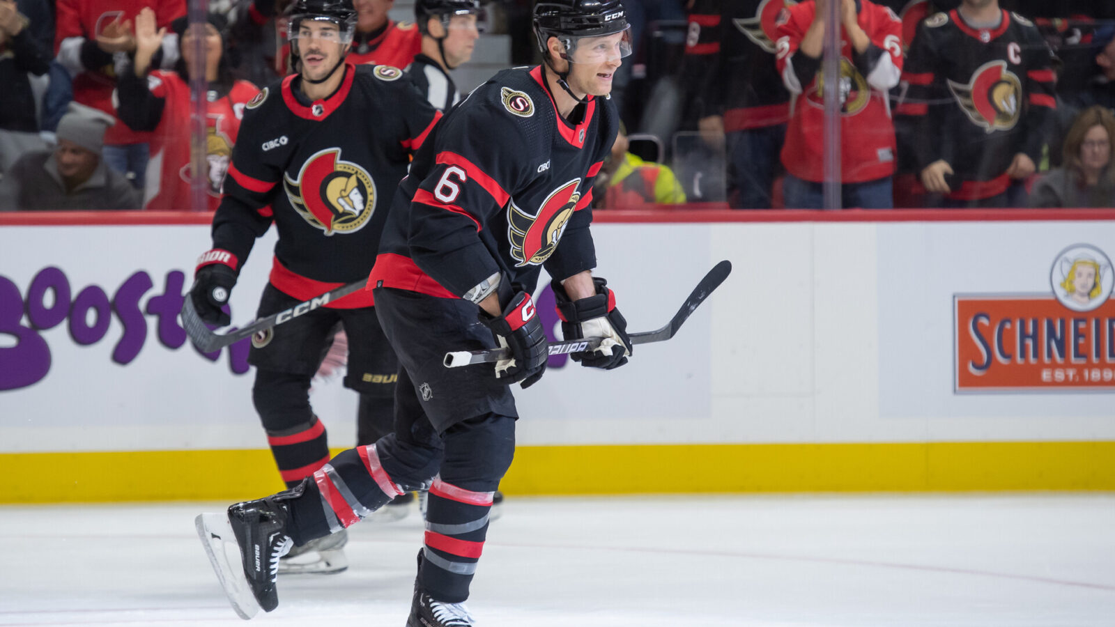 Dec 23, 2023; Ottawa, Ontario, CAN; Ottawa Senators defenseman Jakob Chychrun (6) skates to the bench following his goal scored against the Pittsburgh Penguins in the first period at the Canadian Tire Centre.