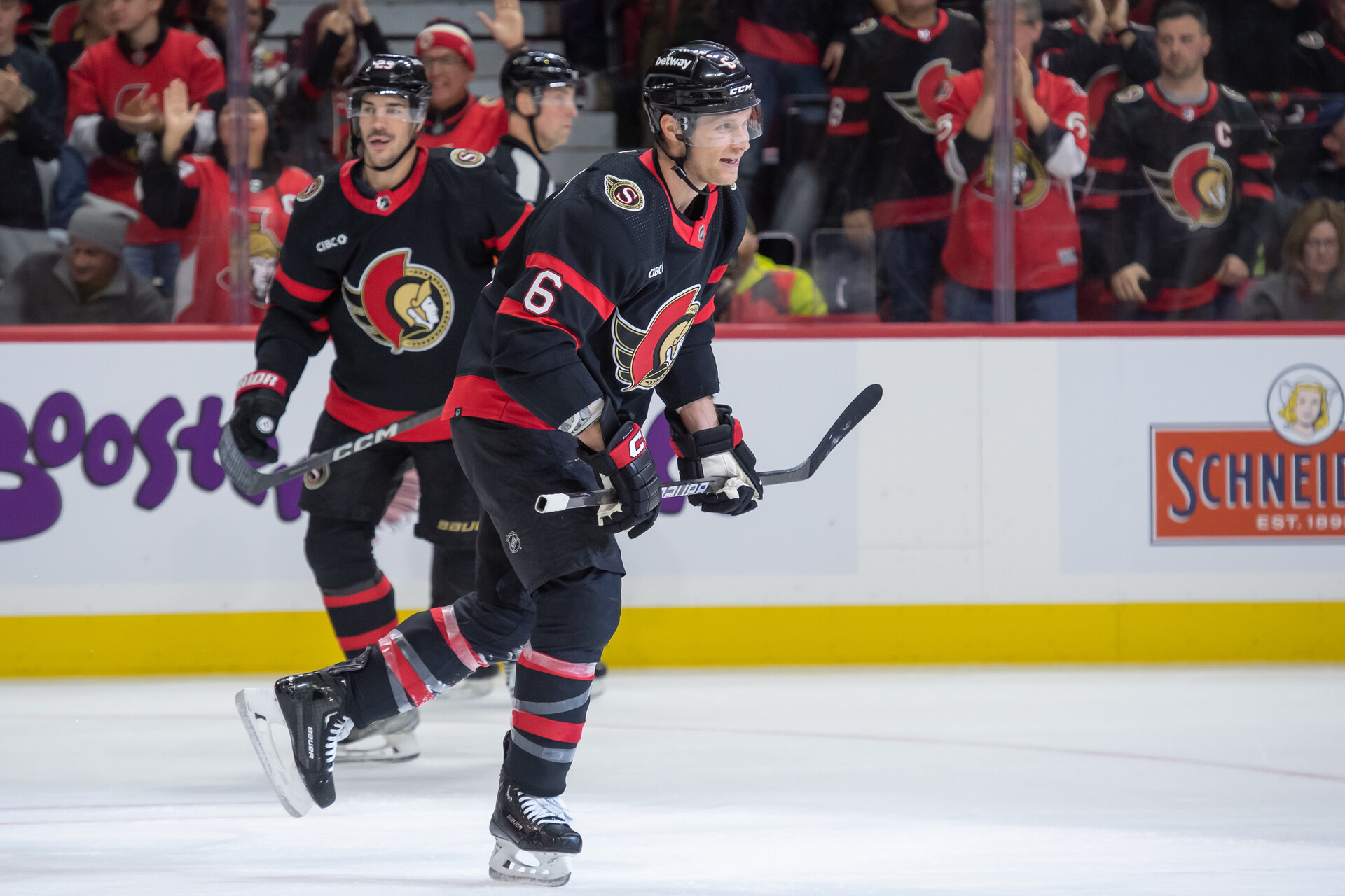 Dec 23, 2023; Ottawa, Ontario, CAN; Ottawa Senators defenseman Jakob Chychrun (6) skates to the bench following his goal scored against the Pittsburgh Penguins in the first period at the Canadian Tire Centre.