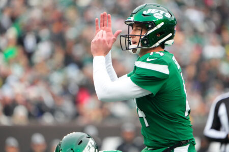New York Jets quarterback Trevor Siemian (14) calls timeout against the Washington Commanders in the first half at MetLife Stadium.