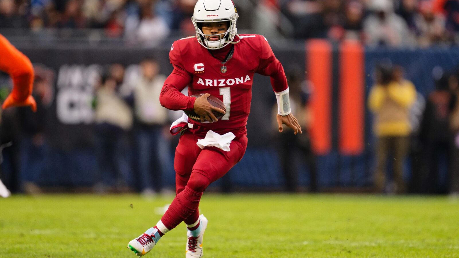 Dec 24, 2023; Chicago, Illinois, USA; Arizona Cardinals quarterback Kyler Murray (1) runs with the ball against the Chicago Bears at Soldier Field.