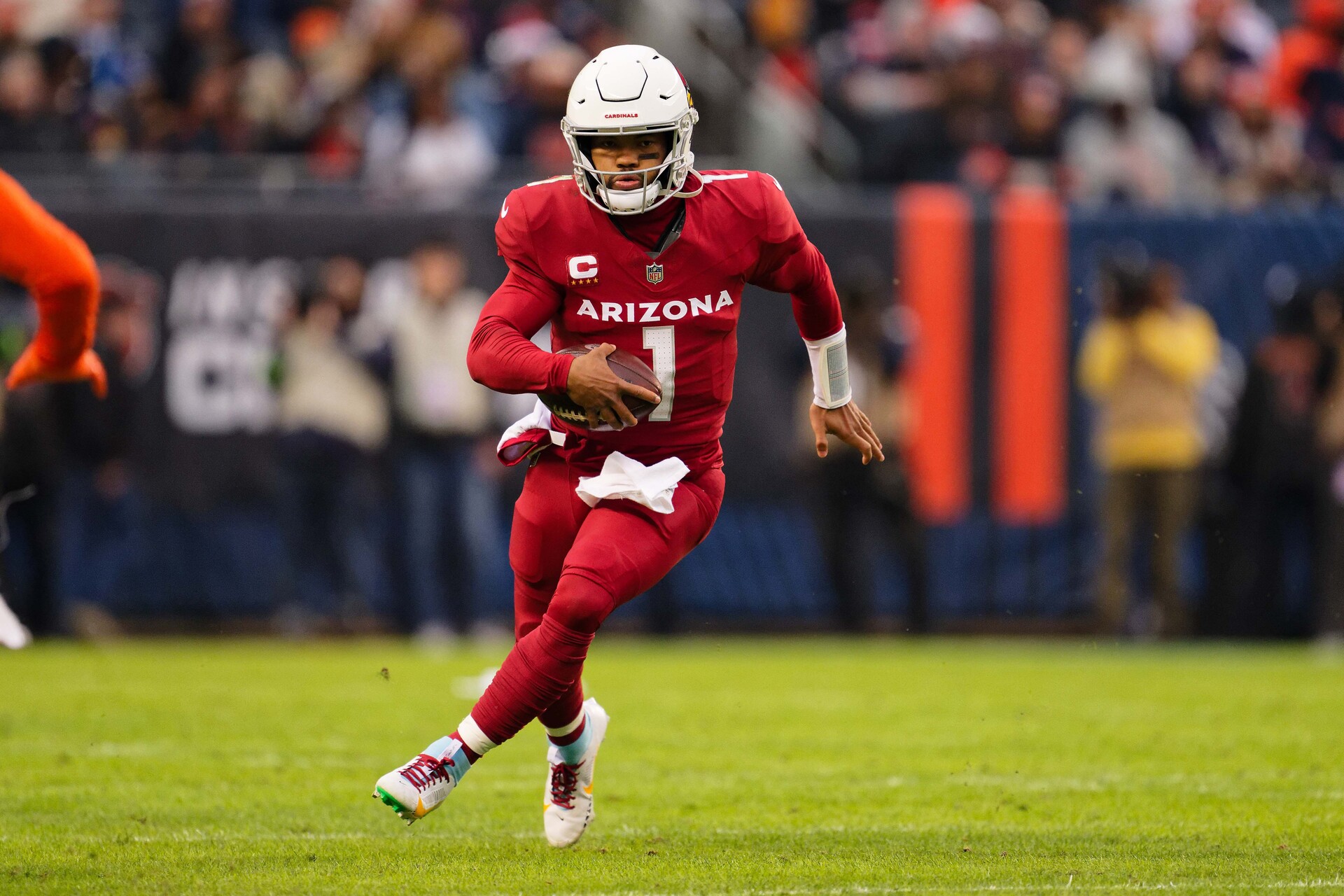 Dec 24, 2023; Chicago, Illinois, USA; Arizona Cardinals quarterback Kyler Murray (1) runs with the ball against the Chicago Bears at Soldier Field.