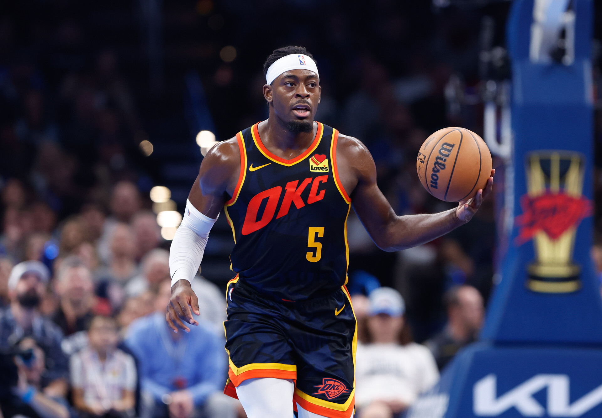 Oklahoma City Thunder guard Luguentz Dort (5) dribbles the ball down the court during the second half against the San Antonio Spurs at Paycom Center.