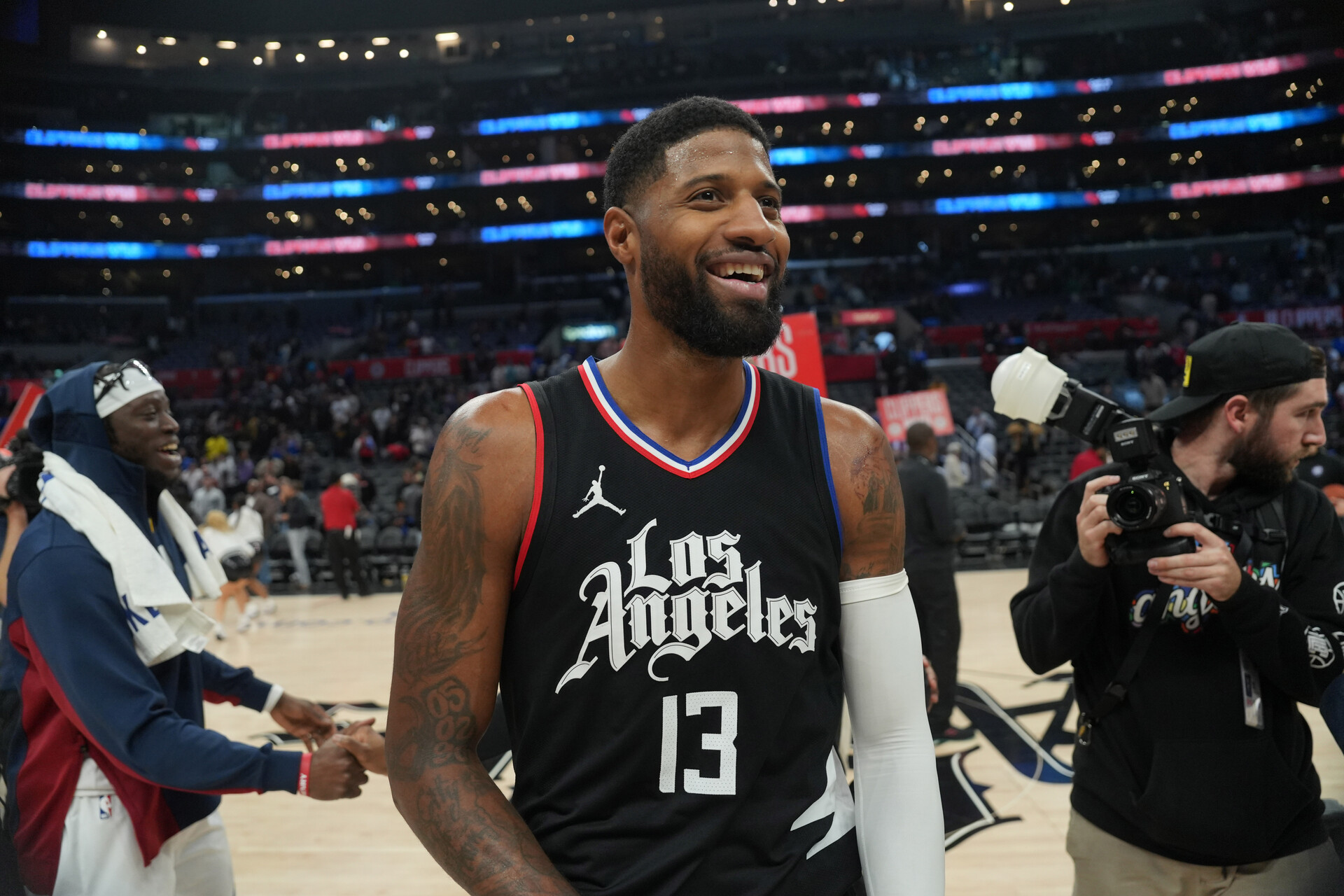 LA Clippers forward Paul George (13) reacts after the game against the Denver Nuggets at Crypto.com Arena.