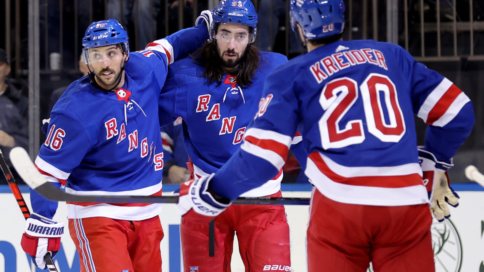 New York Rangers center Mika Zibanejad (93) celebrates his goal against the Toronto Maple Leafs with center Vincent Trocheck (16) and left wing Chris Kreider (20) during the second period at Madison Square Garden.