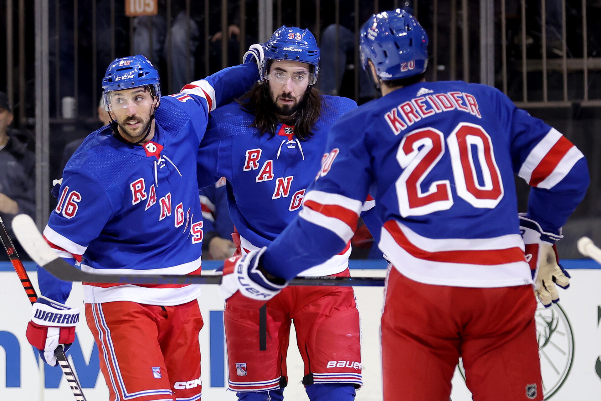 New York Rangers center Mika Zibanejad (93) celebrates his goal against the Toronto Maple Leafs with center Vincent Trocheck (16) and left wing Chris Kreider (20) during the second period at Madison Square Garden.