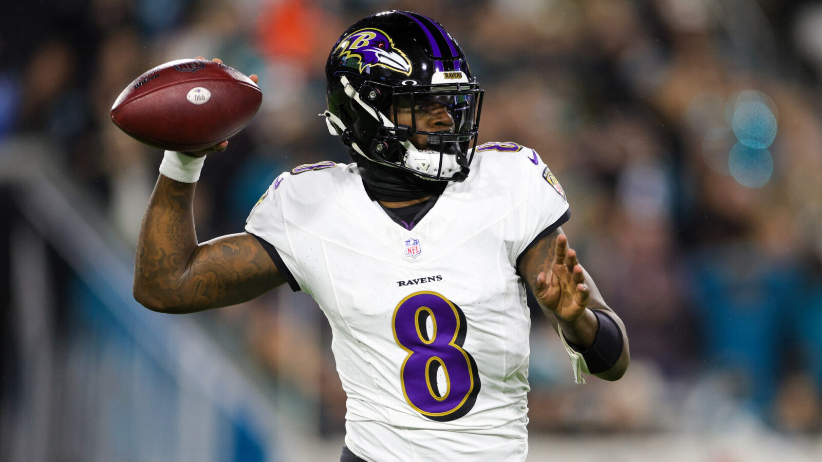 Baltimore Ravens quarterback Lamar Jackson (8) drops back to pass against the Jacksonville Jaguars in the first quarter at EverBank Stadium.