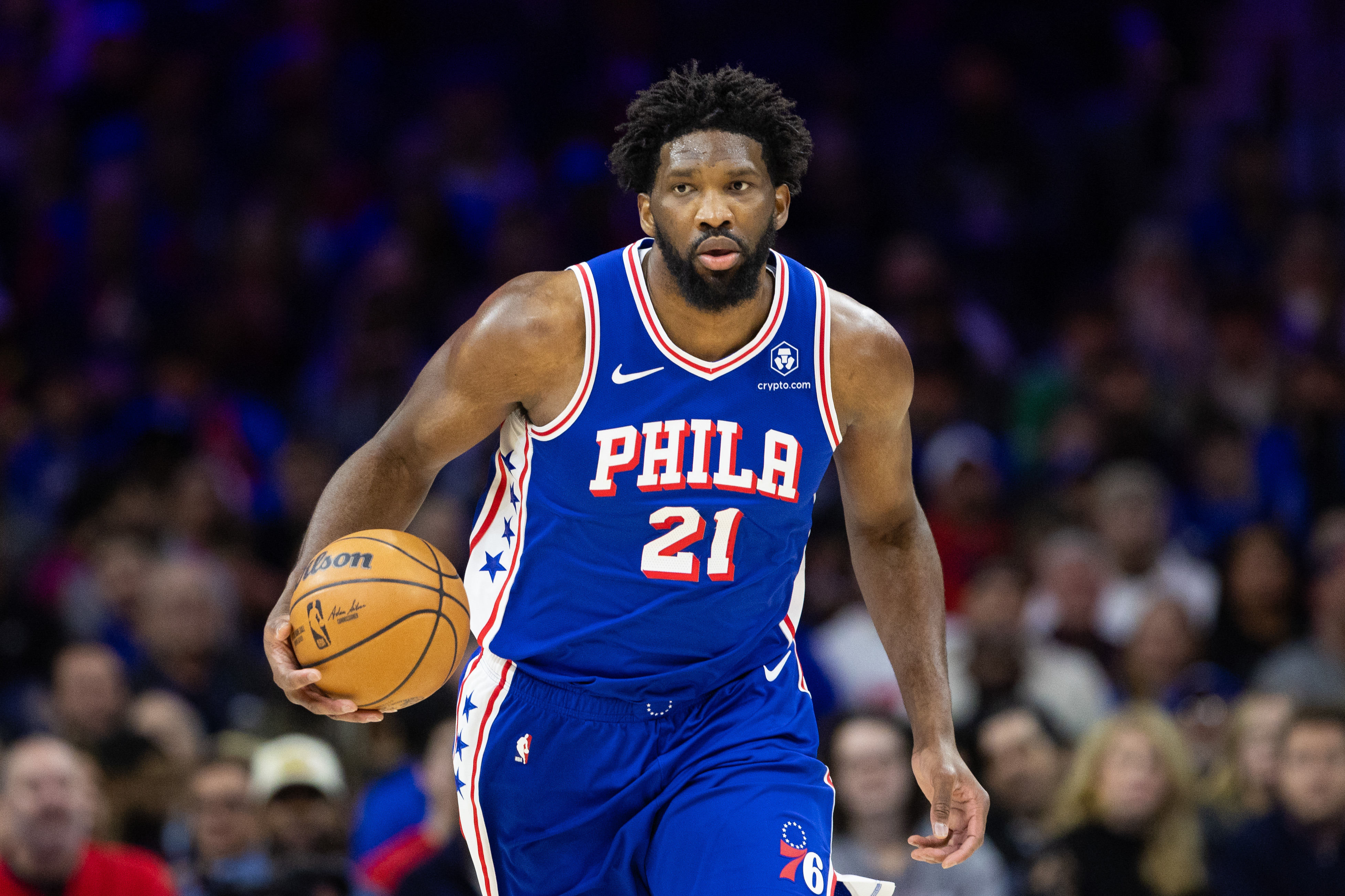 Philadelphia 76ers center Joel Embiid (21) dribbles up court against the Chicago Bulls during the first quarter at Wells Fargo Center.