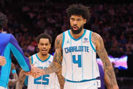 Charlotte Hornets center Nick Richards (4) celebrates with his teammates at a time out against the Sacramento Kings during the fourth quarter at Golden 1 Center.