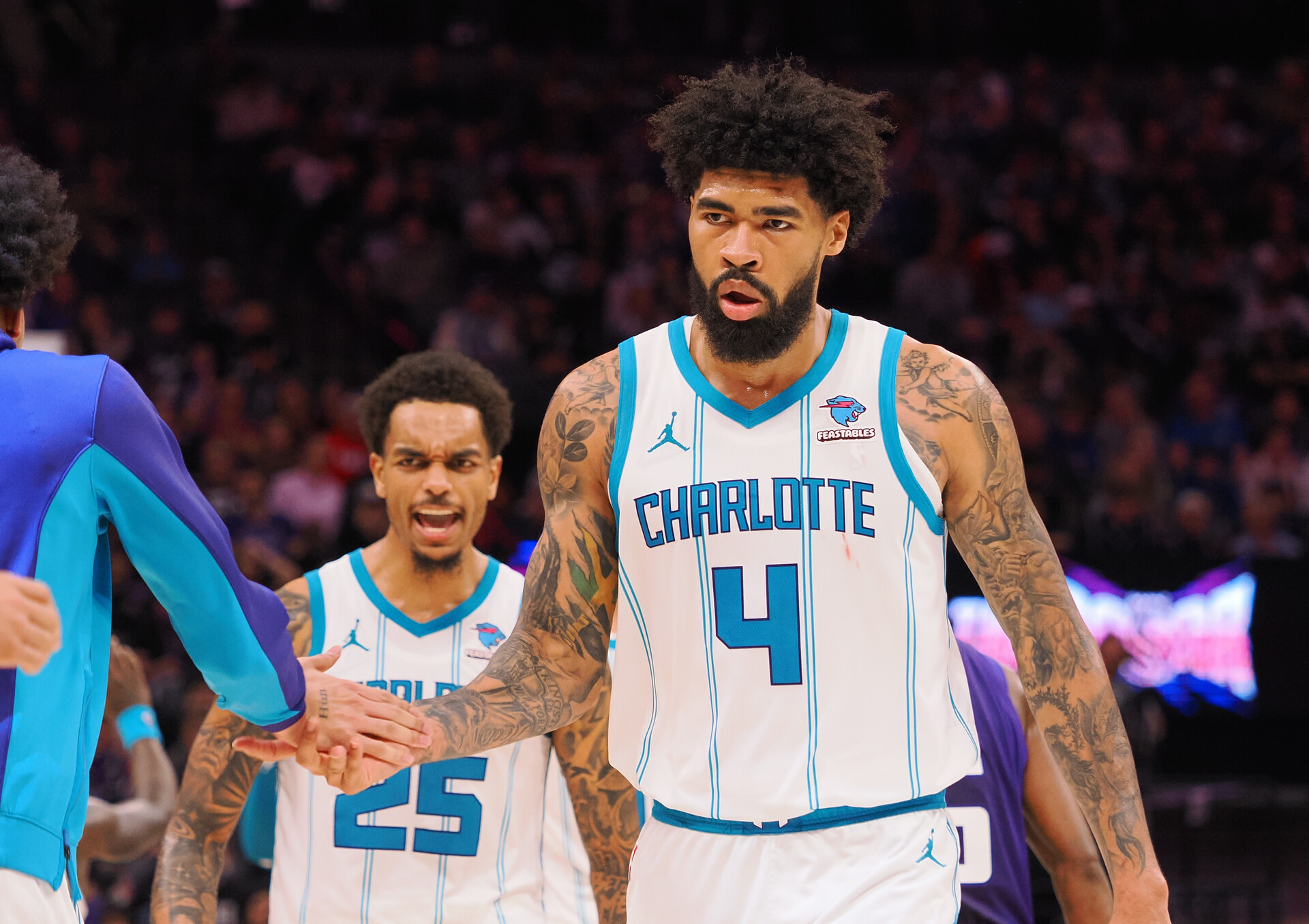 Charlotte Hornets center Nick Richards (4) celebrates with his teammates at a time out against the Sacramento Kings during the fourth quarter at Golden 1 Center.