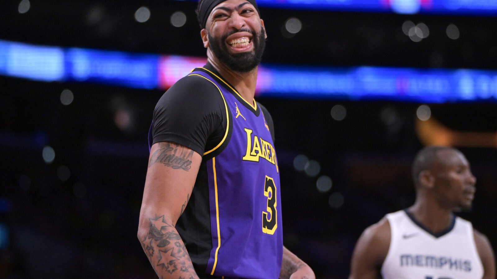Los Angeles Lakers forward Anthony Davis (3) smiles on the court in the first half against the Memphis Grizzlies at Crypto.com Arena.
