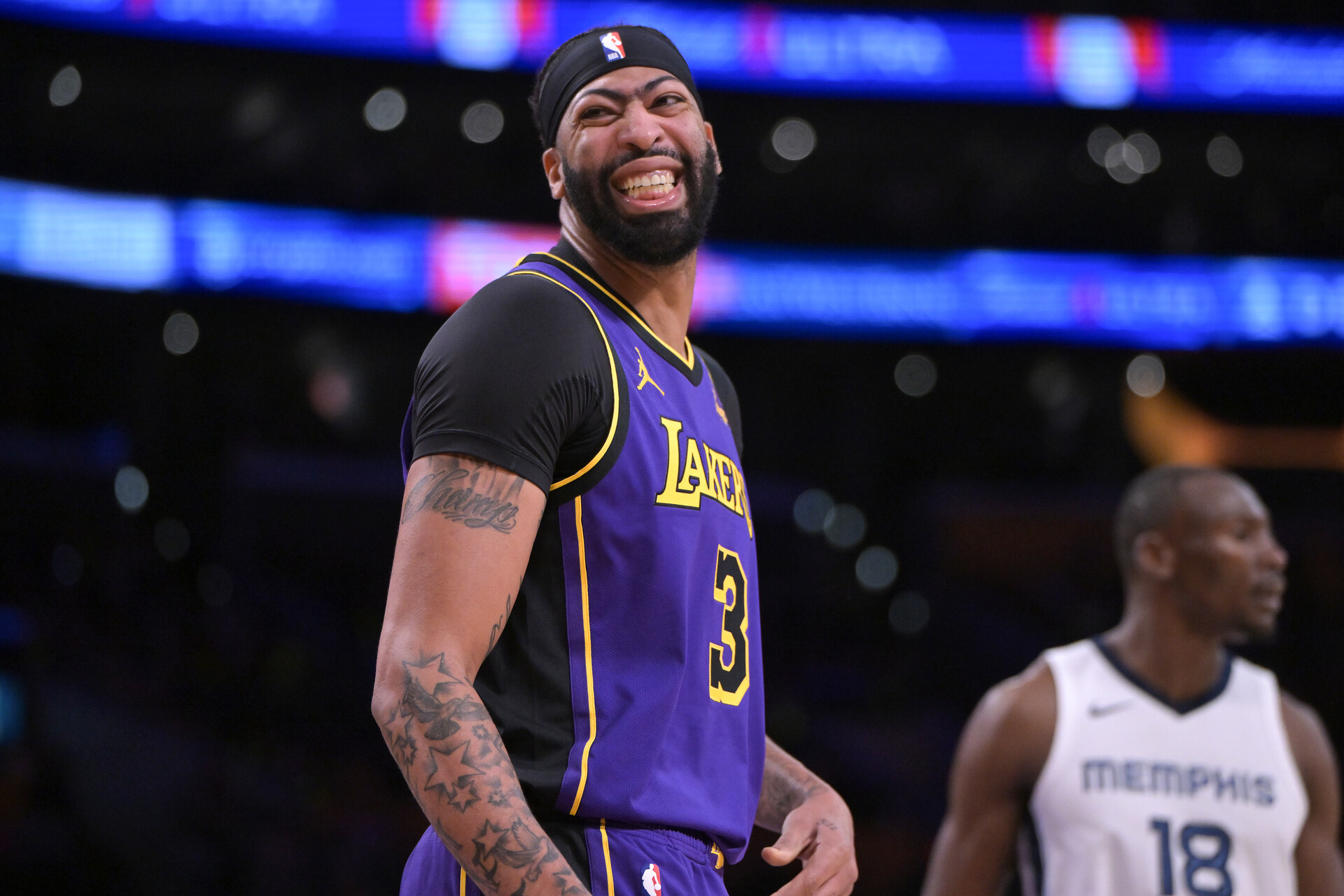 Los Angeles Lakers forward Anthony Davis (3) smiles on the court in the first half against the Memphis Grizzlies at Crypto.com Arena.