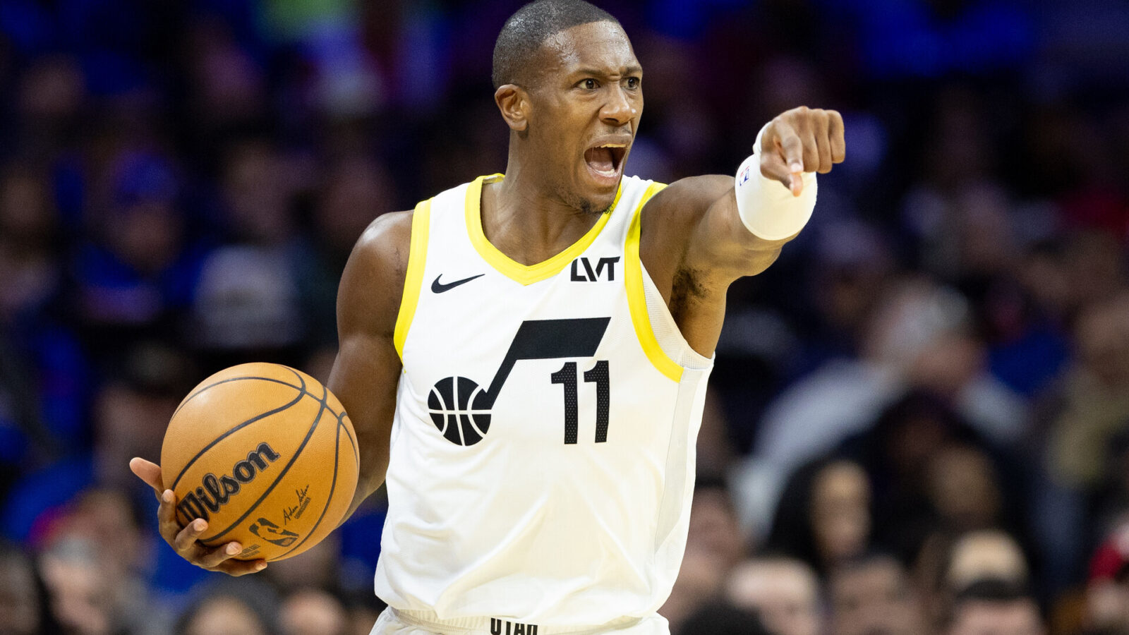 Utah Jazz guard Kris Dunn (11) brings the ball up court against the Philadelphia 76ers during the third quarter at Wells Fargo Center.