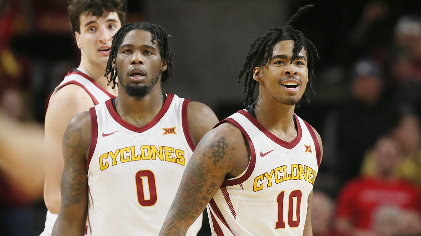 Iowa State Cyclones guard Keshon Gilbert (10), forward Tre King (0), and forward Milan Momcilovic (22) celebrate after a score against Houston during the second half in the Big-12 conference showdown of an NCAA college basketball at Hilton Coliseum on Tuesday, Jan. 9, 2024, in Ames, Iowa.