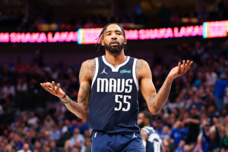 Jan 11, 2024; Dallas, Texas, USA; Dallas Mavericks forward Derrick Jones Jr. (55) reacts after dunking during the second half against the New York Knicks at American Airlines Center.