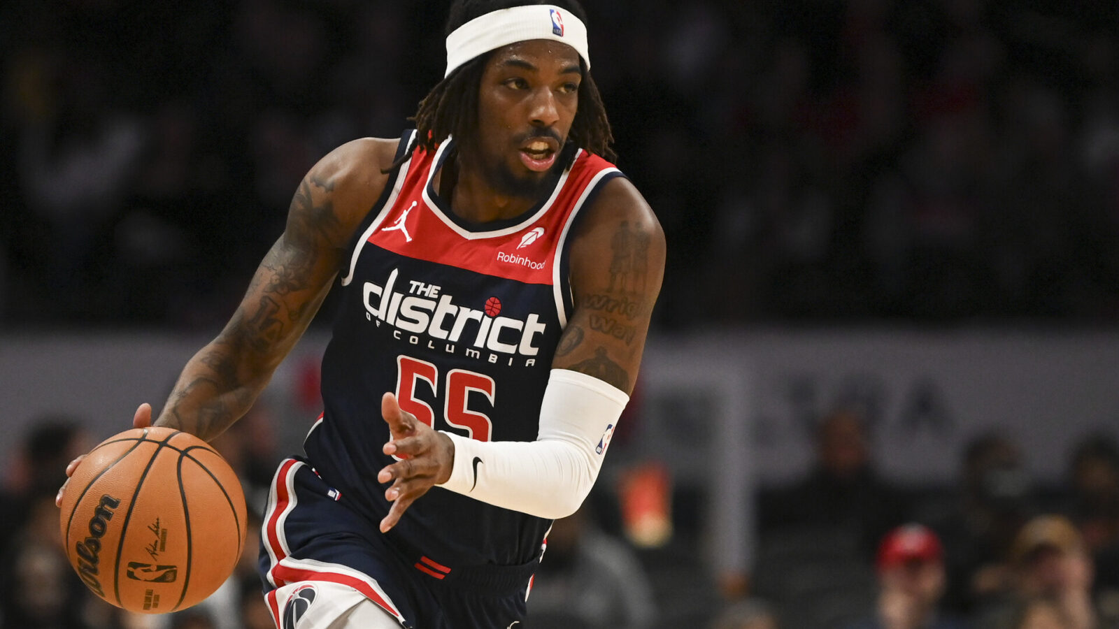 Washington Wizards guard Delon Wright (55) drives up the court during the first half against the Detroit Pistons at Capital One Arena.