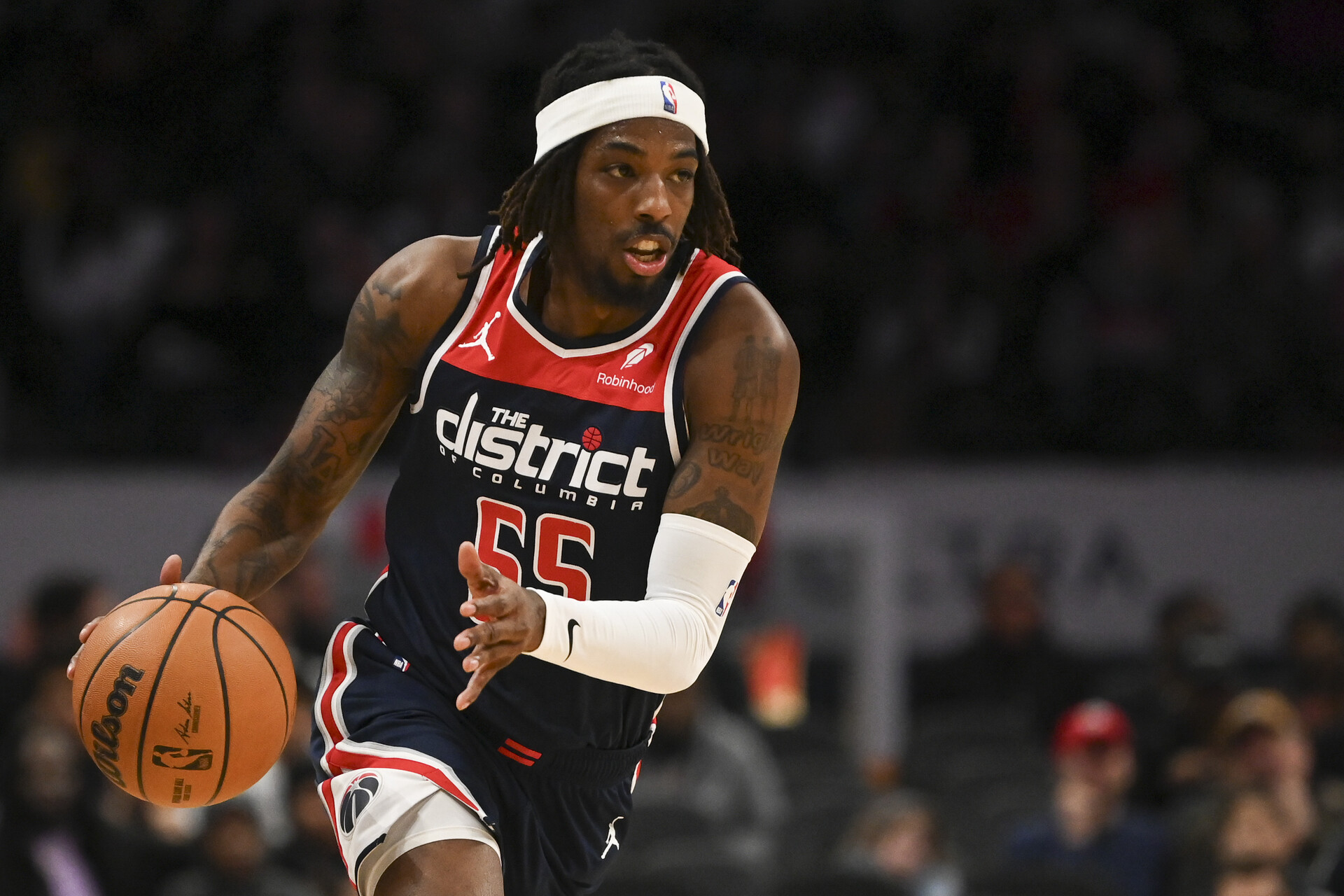 Washington Wizards guard Delon Wright (55) drives up the court during the first half against the Detroit Pistons at Capital One Arena.