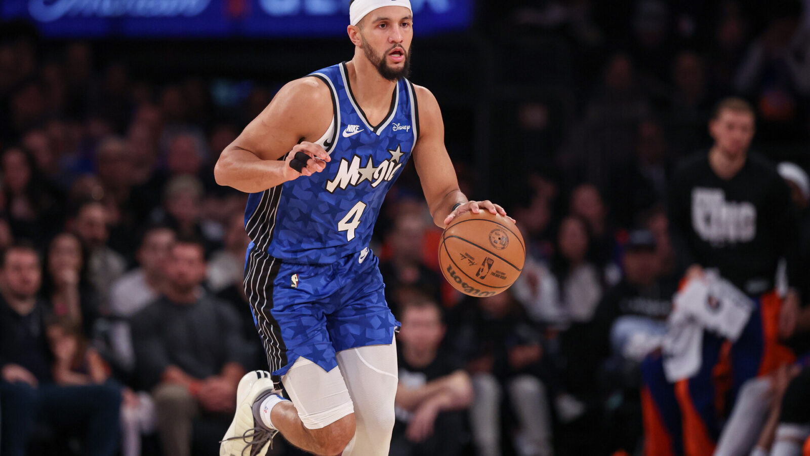 Jan 15, 2024; New York, New York, USA; Orlando Magic guard Jalen Suggs (4) dribbles up court during the first half against the New York Knicks at Madison Square Garden.