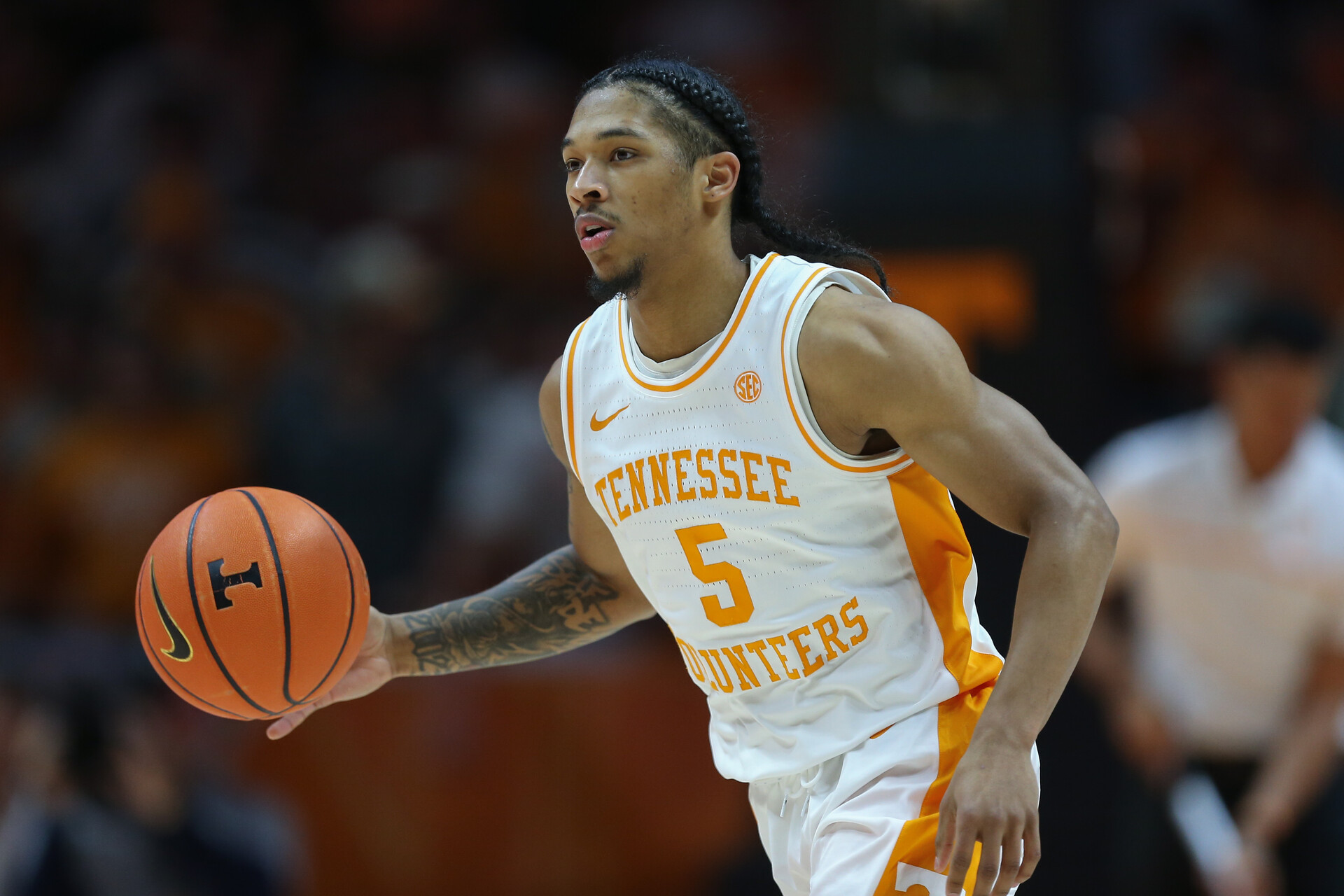 Tennessee Volunteers guard Zakai Zeigler (5) dribbles the ball against the Florida Gators during the second half at Thompson-Boling Arena at Food City Center.