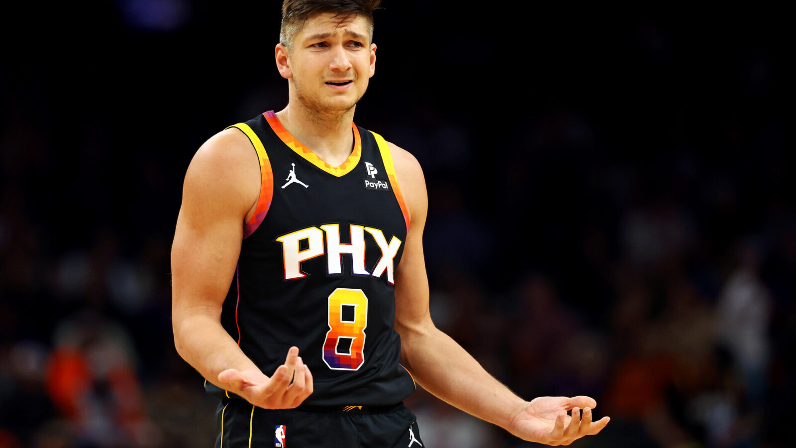 Jan 16, 2024; Phoenix, Arizona, USA; Phoenix Suns guard Grayson Allen (8) reacts to a play during the second quarter against the Sacramento Kings at Footprint Center.