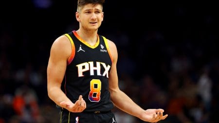 Jan 16, 2024; Phoenix, Arizona, USA; Phoenix Suns guard Grayson Allen (8) reacts to a play during the second quarter against the Sacramento Kings at Footprint Center.