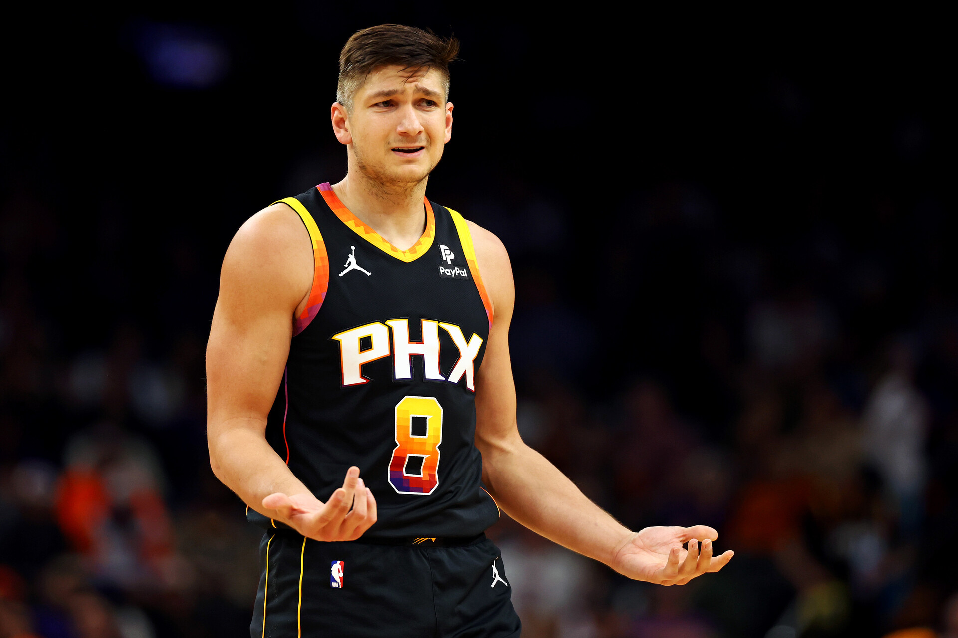 Jan 16, 2024; Phoenix, Arizona, USA; Phoenix Suns guard Grayson Allen (8) reacts to a play during the second quarter against the Sacramento Kings at Footprint Center.