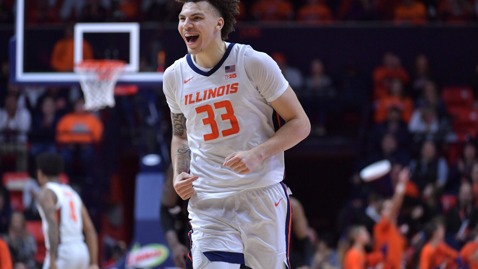 Illinois Fighting Illini forward Coleman Hawkins (33) reacts after scoring during the second half against the Rutgers Scarlet Knights at State Farm Center.