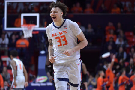 Illinois Fighting Illini forward Coleman Hawkins (33) reacts after scoring during the second half against the Rutgers Scarlet Knights at State Farm Center.