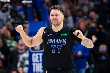 Dallas Mavericks guard Luka Doncic (77) reacts during the first half against the Phoenix Suns at American Airlines Center.