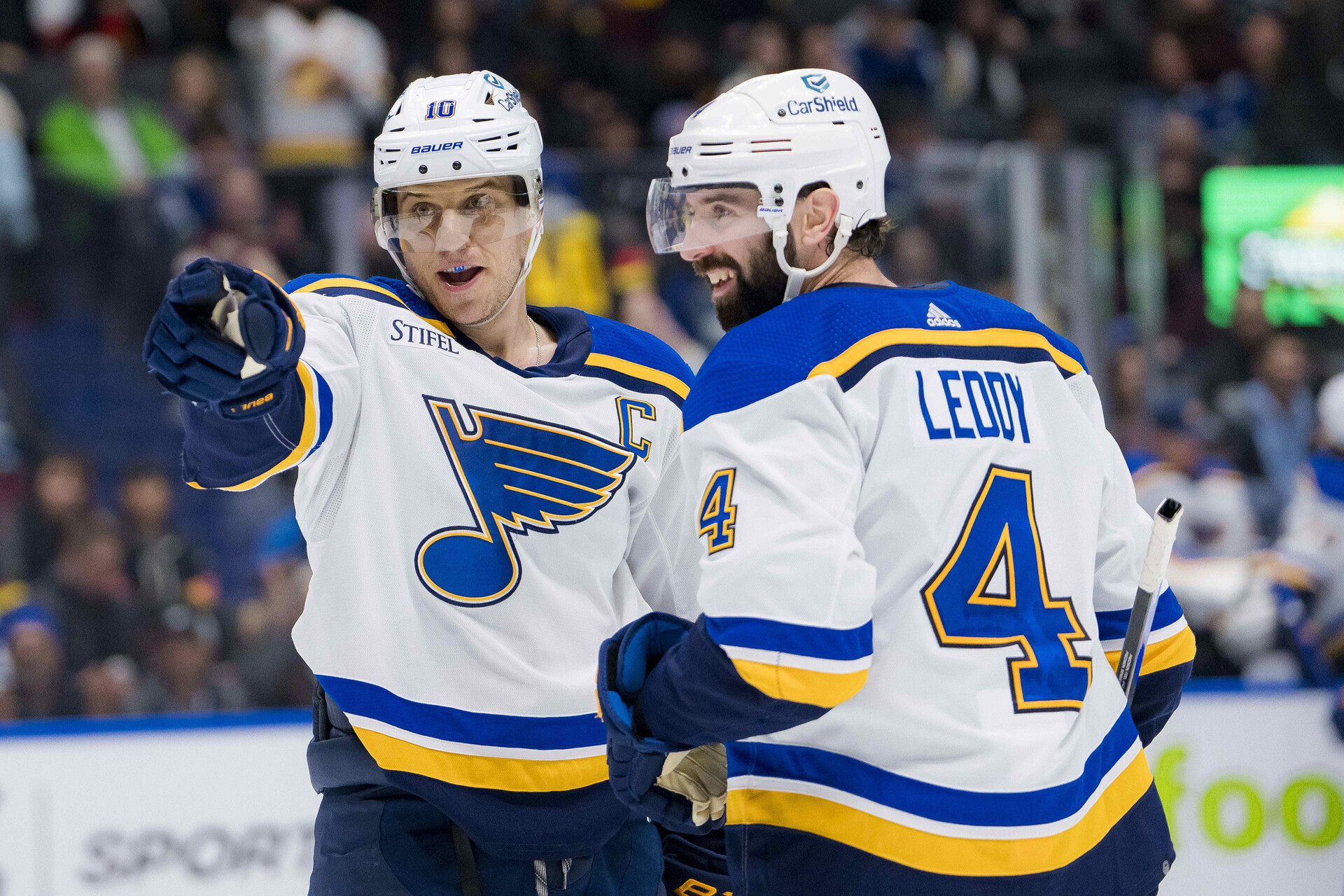 St. Louis Blues forward Brayden Schenn (10) and defenseman Nick Leddy (4) celebrate Schenn’s game winning goal against the Vancouver Canucks in overtime at Rogers Arena. Blues 4-3 in overtime.