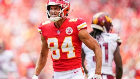 Kansas City Chiefs wide receiver Justin Watson (84) celebrates after catching a pass against the Washington Commanders during the first half at GEHA Field at Arrowhead Stadium.