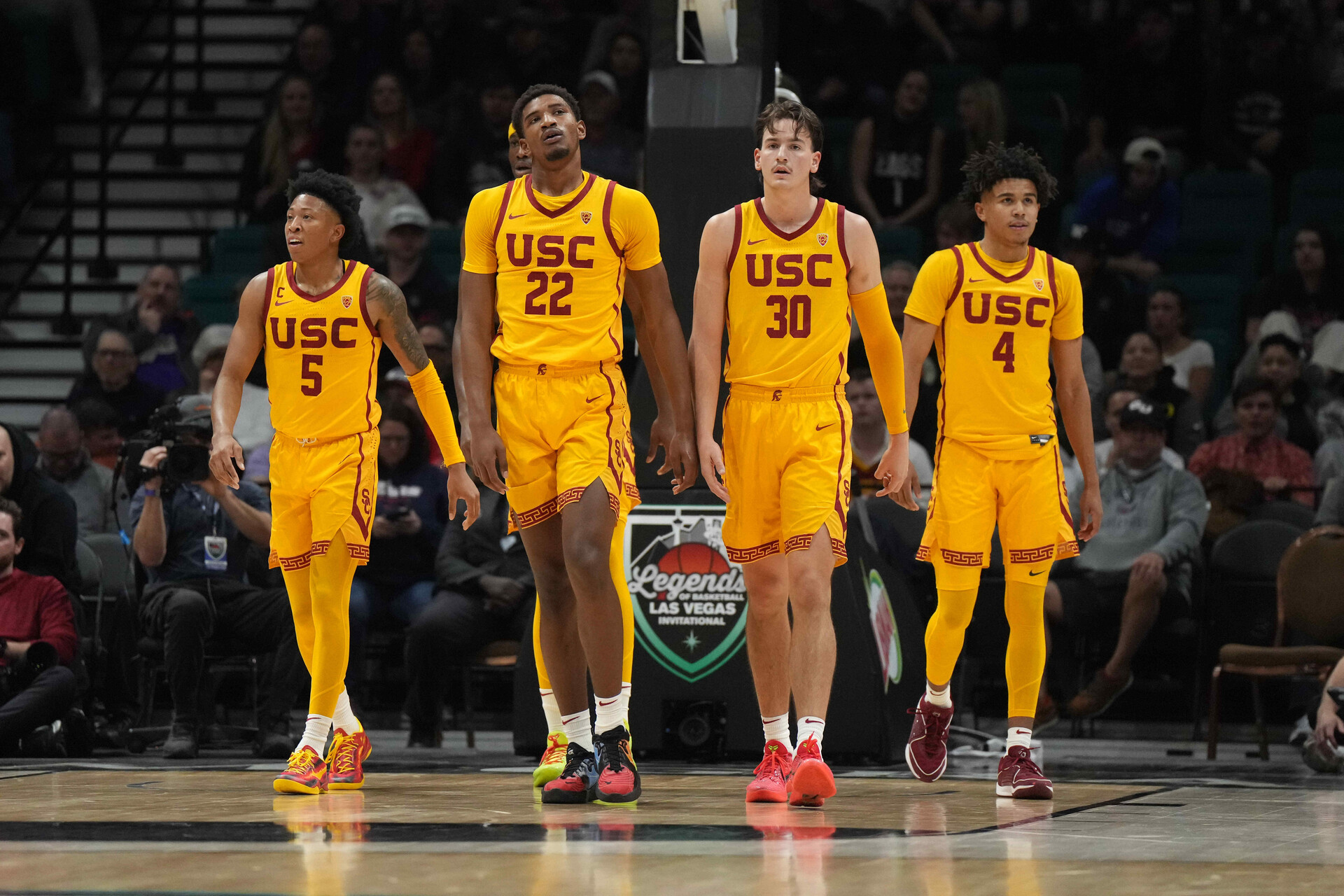 Dec 2, 2023; Las Vegas, Nevada, USA; Southern California Trojans guard Boogie Ellis (5), forward Arrinten Page (22), forward Harrison Hornery (30) and guard Oziyah Sellers (4) react during the Legends of Basketball Las Vegas Invitational against the Gonzaga Bulldogs at MGM Grand Garden Arena.