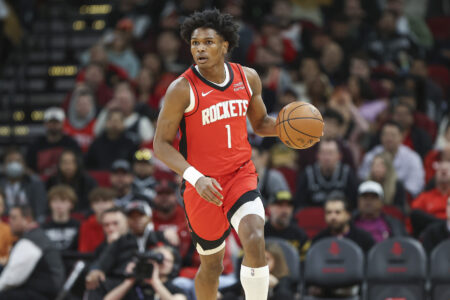 Houston Rockets forward Amen Thompson (1) brings the ball up the court during the second quarter against the San Antonio Spurs at Toyota Center.