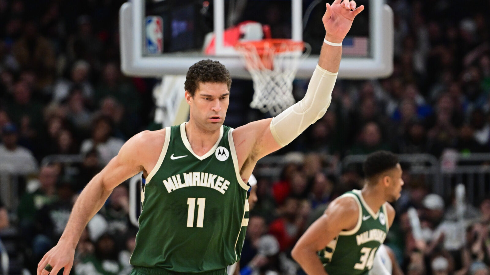 Milwaukee Bucks center Brook Lopez (11) reacts after scoring a basket the third quarter against the Orlando Magic at Fiserv Forum.