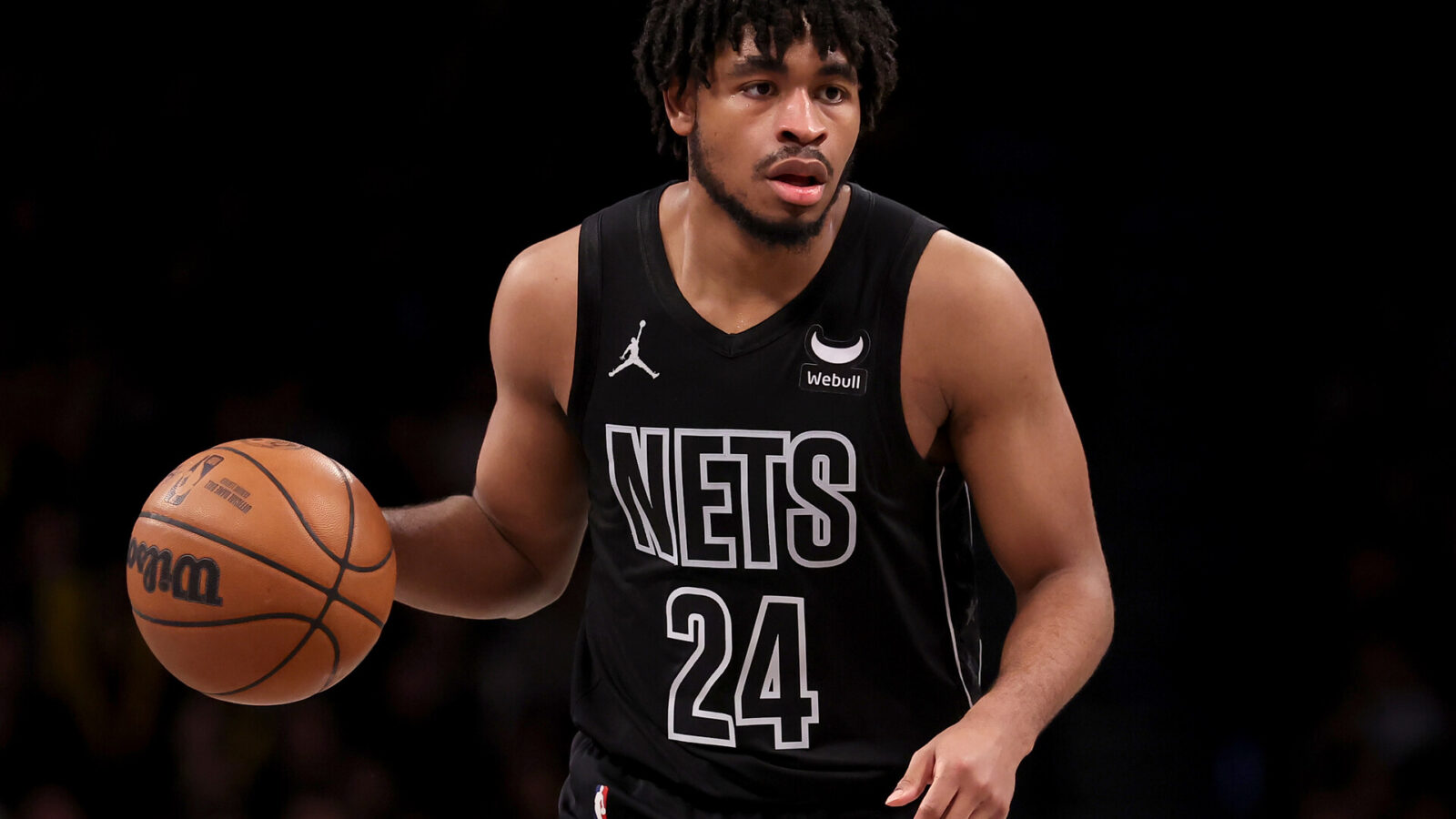 Brooklyn Nets guard Cam Thomas (24) controls the ball against the Denver Nuggets during the fourth quarter at Barclays Center.