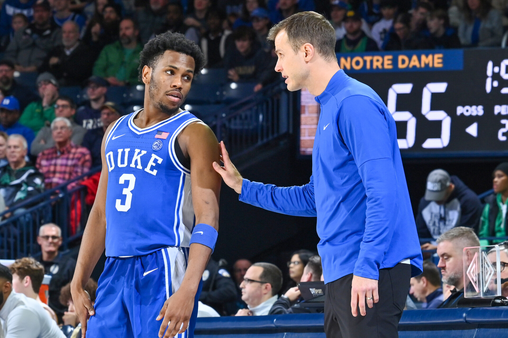 Duke Blue Devils head coach Jon Scheyer talks to guard Jeremy Roach (3) in the second half against the Notre Dame Fighting Irish at the Purcell Pavilion.
