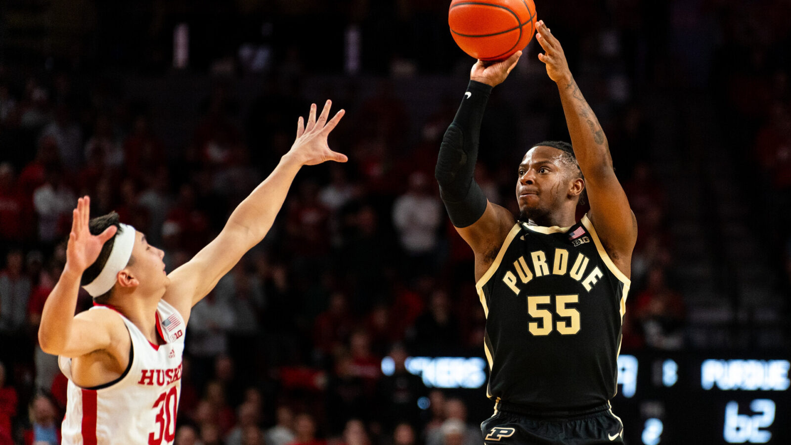 Purdue Boilermakers guard Lance Jones (55) shoots the ball against Nebraska Cornhuskers guard Keisei Tominaga (30) during the second half at Pinnacle Bank Arena.