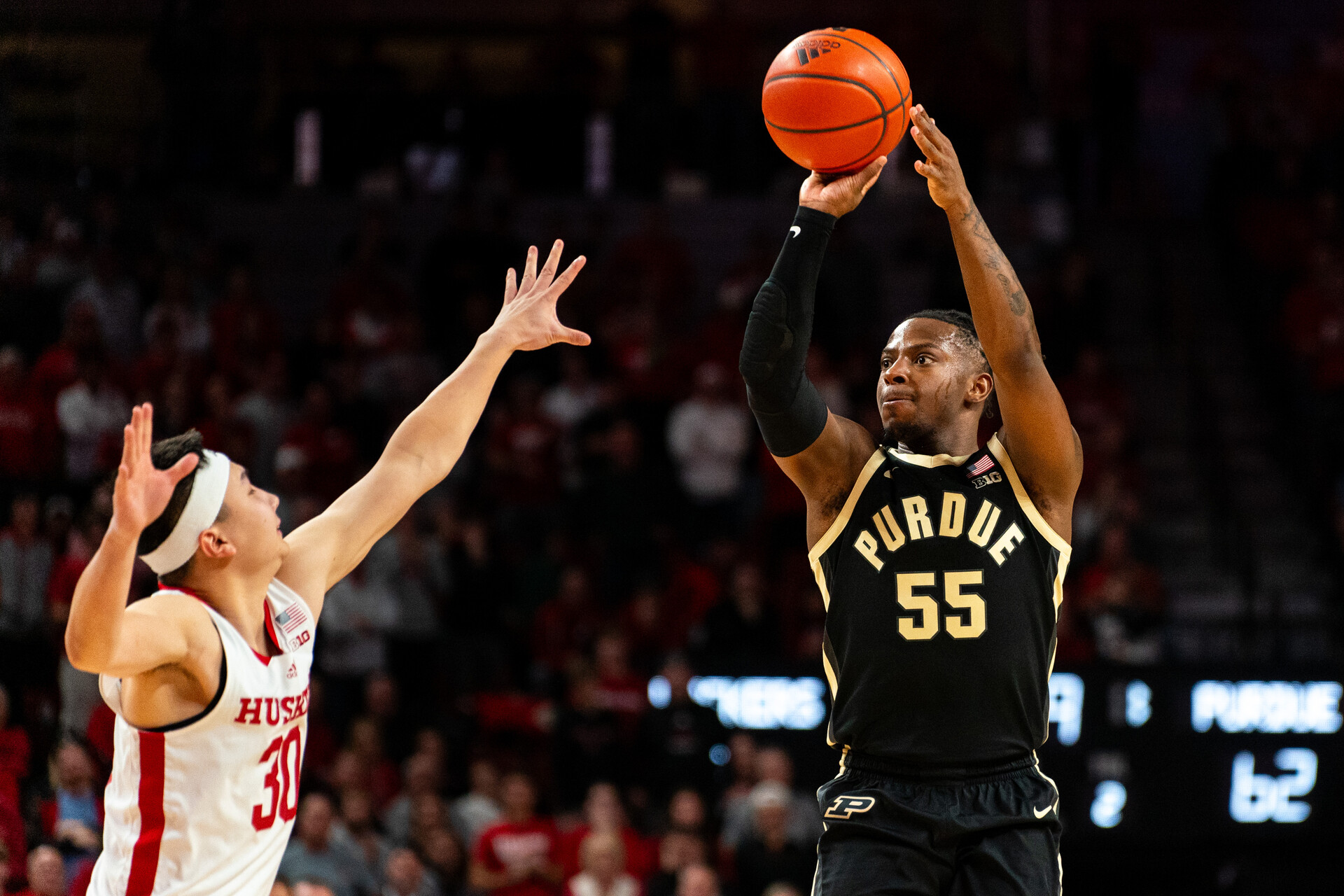 Purdue Boilermakers guard Lance Jones (55) shoots the ball against Nebraska Cornhuskers guard Keisei Tominaga (30) during the second half at Pinnacle Bank Arena.