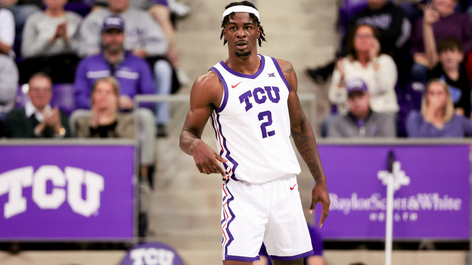 Jan 13, 2024; Fort Worth, Texas, USA; TCU Horned Frogs forward Emanuel Miller (2) reacts during the first half against the Houston Cougars at Ed and Rae Schollmaier Arena.