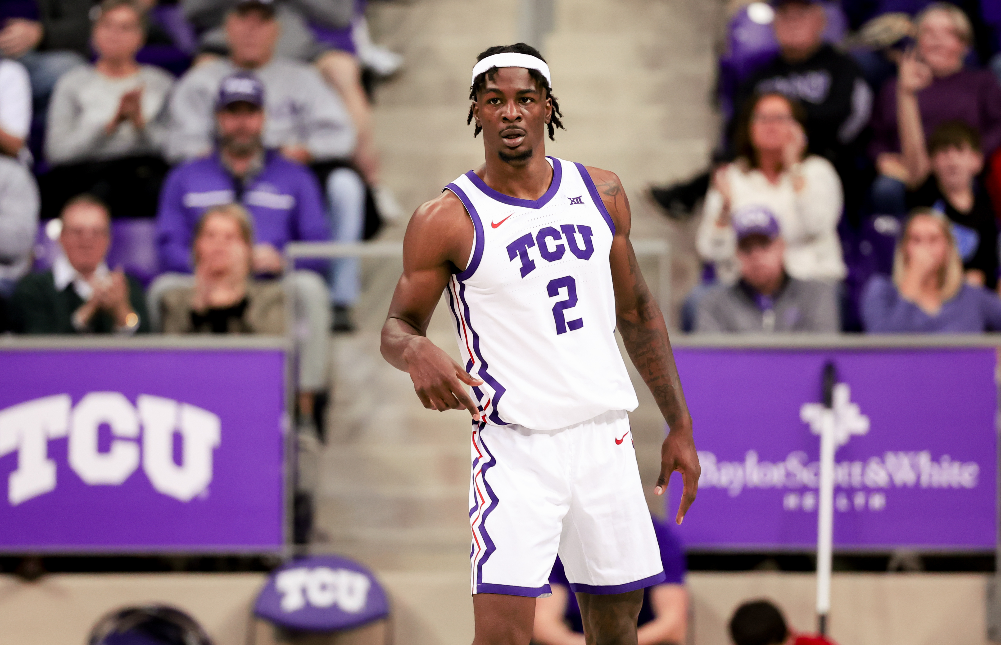 Jan 13, 2024; Fort Worth, Texas, USA; TCU Horned Frogs forward Emanuel Miller (2) reacts during the first half against the Houston Cougars at Ed and Rae Schollmaier Arena.