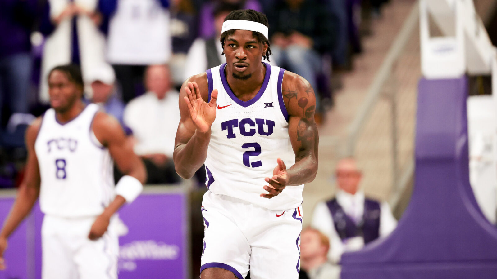 TCU Horned Frogs forward Emanuel Miller (2) reacts after scoring during the first half against the Houston Cougars at Ed and Rae Schollmaier Arena.