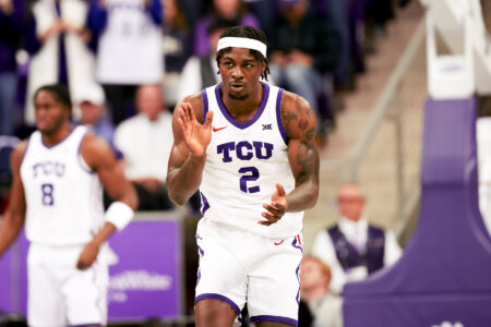 TCU Horned Frogs forward Emanuel Miller (2) reacts after scoring during the first half against the Houston Cougars at Ed and Rae Schollmaier Arena.