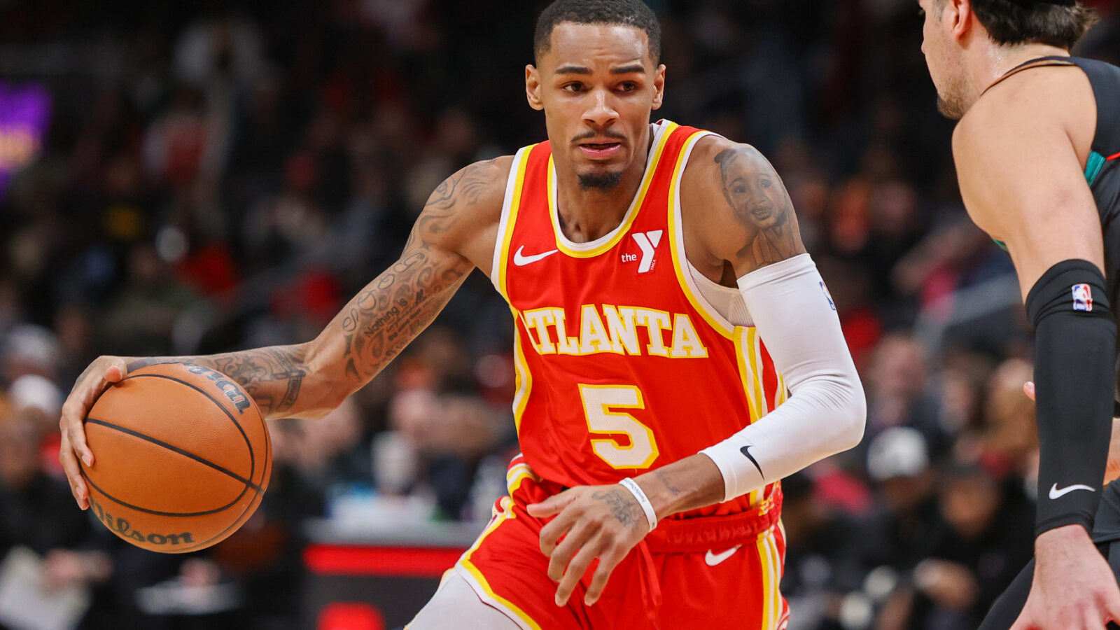 Atlanta Hawks guard Dejounte Murray (5) drives to the basket against the Washington Wizards in the second quarter at State Farm Arena.