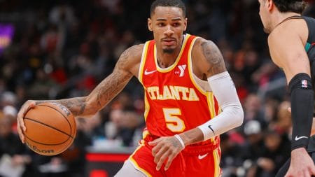 Atlanta Hawks guard Dejounte Murray (5) drives to the basket against the Washington Wizards in the second quarter at State Farm Arena.