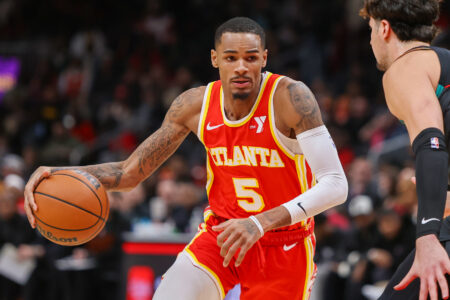 Atlanta Hawks guard Dejounte Murray (5) drives to the basket against the Washington Wizards in the second quarter at State Farm Arena.