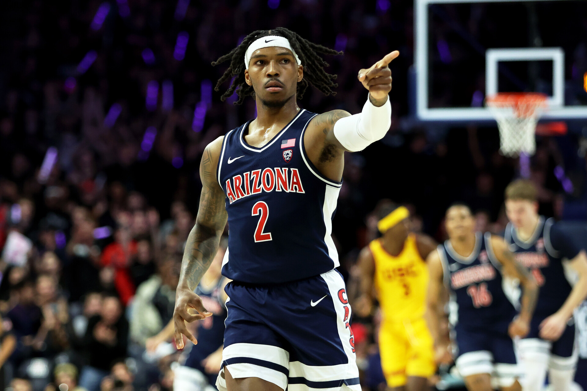 Jan 17, 2024; Tucson, Arizona, USA; Arizona Wildcats guard Caleb Love (2) celebrates a three point basket with the Arizona Wildcats bench against the USC Trojansduring the first half at McKale Center.