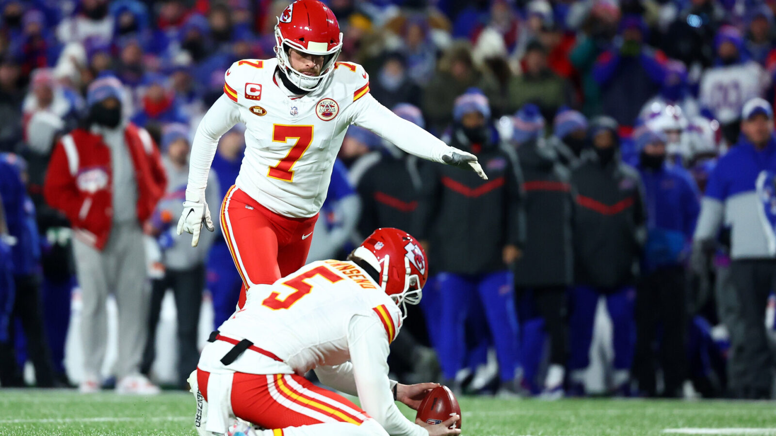 Jan 21, 2024; Orchard Park, New York, USA; Kansas City Chiefs place kicker Harrison Butker (7) kicks a field goal against the Buffalo Bills during the first half for the 2024 AFC divisional round game at Highmark Stadium.
